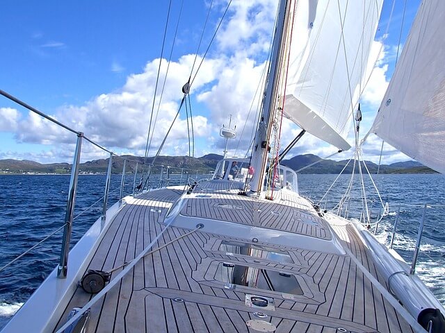 A Sailboat deck, sailing calm waters