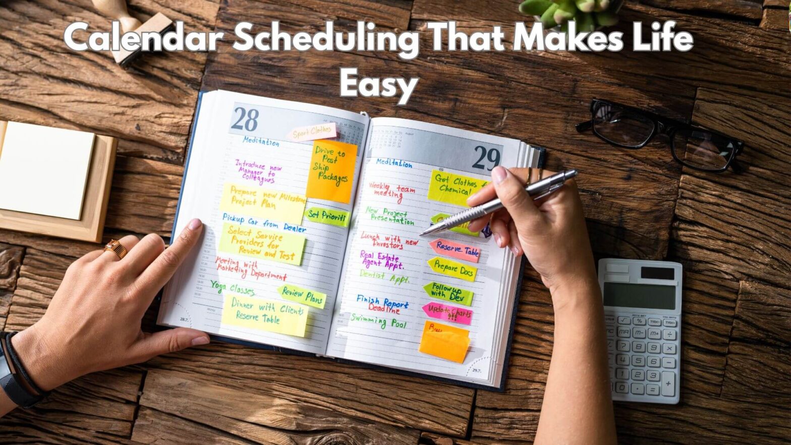 A person's hands holding a pen on a calendar with sticky notes on a desk. With text that reads Calendar Scheduling That Makes Life Easy