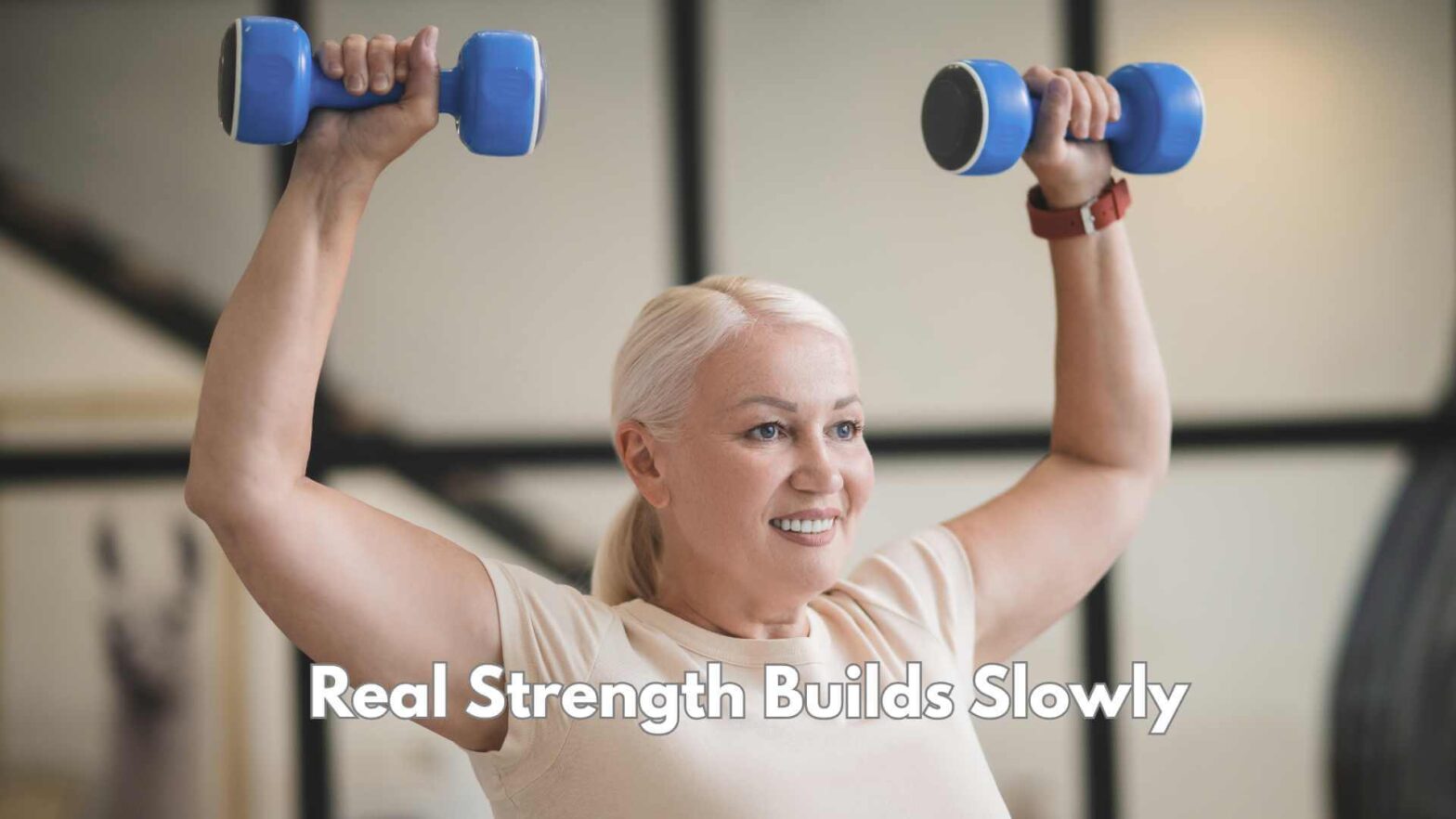 A Women Using Small Weights and doing over head presses. Text saying Real Strength Builds Slowly